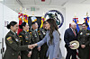 Homeland Security Secretary Kristi Noem greets officers as she arrives for a meeting with the National Police's Counter Organized Crime Group at the Colombian National Police Directorate in Bogota, Colombia, on March 27. [AP/YONHAP]