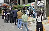 Customers wait in a line to replace their SIM cards in front of an official SK Telecom retailer in Seoul on May 20. [YONHAP]