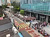 Police estimate that some 1,500 fans have lined up in front of the HYBE headquarters in Yongsan District, central Seoul, on June 10, celebrating the discharge of BTS members V and RM. [BIGHIT MUSIC]