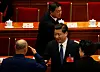 Xu Qiliang, left, vice Chairman of China's Central Military Commission, salutes China's President Xi Jinping, center, during the closing ceremony of the Chinese National People's Congress at the Great Hall of the People, in Beijing, March 13, 2014. [REUTERS/YONHAP]