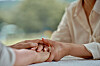 A closeup of older people's hands [GETTY IMAGES BANK]