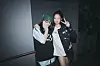 Eilish and Jennie pose for the camera backstage at the listening event. [SPOTIFY]