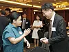 Ambassador of the Philippines Theresa Dizon-De Vega, left, and Director of National Policy Sung Tae-yoon, right, exchange greetings during the 18th Korea Economic Forum at Lotte Hotel in Jung District, central Seoul, on Thursday. [PARK SANG-MOON]