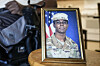 A portrait of American soldier Travis King is displayed as his grandfather, Carl Gates, talks about his grandson on July 19 in Kenosha, Wisconsin. [AP]