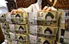 A staff member sorts 50,000-won banknotes at Hana Bank’s Counterfeit Response Center in central Seoul on Feb. 24. [NEWS1]