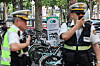 Police officers monitor the area around Seongsu Station in Seongdong District, eastern Seoul, following an announcement by a group of outlaw public bicycle riders known as ″Bicycle Crash.' [YONHAP]