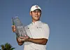 Kim Si-woo poses with The Players trophy at The Players Stadium Course at TPC Sawgrass in Ponte Vedra Beach on May 14, 2017. [PGA]