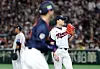 Korean reliever Jo Byeong-hyeon, right, reacts after giving up a bases-loaded walk to Ryota Isobata of Japan during the teams' exhibition baseball game at Tokyo Dome in Tokyo on Nov. 16, 2025. [YONHAP]