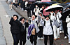 Students leave a high school in Suwon, Gyeonggi, in joy after completing the College Scholastic Ability Test (CSAT) on Thursday. [YONHAP]