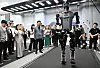 Seoul Mayor Oh Se-hoon, seventh from left, watches Tiangong, an electronically driven humanoid, move at the Humanoid Robot Innovation Center in Beijing on Wednesday. [SEOUL METROPOLITAN GOVERNMENT]