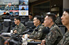 Joint Chiefs of Staff Chairman Gen. Jin Yong-sung, second from left, speaks during a military video conference meeting at an unspecified location in this photo provided by his office on Jan. 1. [YONHAP]