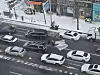 A tin structure lies in the middle of a street in Daejeon after strong winds blew it off a building on Feb. 7. [YONHAP]