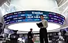 The Kospi and Kosdaq indexes are shown on a screen in Hana Bank's trading room in central Seoul on Feb. 3. [YONHAP]
