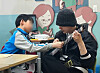 BTS member Suga visits Severance Hospital to volunteer his musical talent while serving as a social service worker in this screen capture of a video uploaded to the hospital's YouTube channel. [SCREEN CAPTURE]