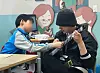 BTS member Suga visits Severance Hospital to volunteer his musical talent while serving as a social service worker in this screen capture of a video uploaded to the hospital's YouTube channel. [SCREEN CAPTURE]