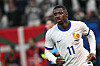 French forward Ousmane Dembélé reacts after scoring a penalty in a penalty shootout during a UEFA Euro 2024 quarterfinal against Portugal at the Volksparkstadion in Hamburg, Germany, on July 5, 2024. [AFP/YONHAP]
