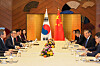 Korean Foreign Minister Cho Tae-yul, second from front in the left row, holds talks with Chinese Foreign Minister Wang Yi in Tokyo on March 21, a day ahead of their planned trilateral meeting with Japanese Foreign Minister Takeshi Iwaya.[MINISTRY OF FOREIGN AFFAIRS]