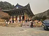 Officials at the Korea Heritage Service transfer important relics stored inside Gounsa, a Buddhist temple in Uiseong county in North Gyeongsang on Monday as wildfire rapidly spread to nearby areas. The temple completely burned down on Tuesday afternoon. [YONHAP]