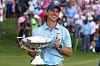 Tommy Fleetwood holds the FedExCup Trophy on the 18th green after winning the Tour Championship in Atlanta, Georgia, on Aug. 24. [REUTERS/YONHAP]