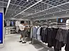 Fashion stylist Rams selects outfits for Aban during a shopping tour at Musinsa Standard in Myeong-dong, central Seoul. [WOO JI-WON]