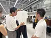 Fashion stylist Rams explains why he chose certain outfits to Jeremy Aban during a shopping tour at Musinsa Standard in Myeong-dong, central Seoul.[WOO JI-WON]