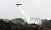 Helicopters from the Korea Forest Service and fire authorities work to extinguish the rekindled wildfire on Mount Hamji in Buk District, Daegu, on May 1, after the fire had been brought under control on April 29. [YONHAP]