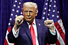 U.S. President Donald Trump gestures as he addresses House Republicans at their annual issues conference retreat, at the Kennedy Center, renamed the Trump-Kennedy Center by the Trump-appointed board of directors, in Washington on Jan. 6. [REUTERS/YONHAP]