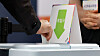 A voter casts their ballot at an early voting station in Gangnam District, southern Seoul on May 29. [NEWS1]