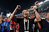 Vietnamese national team manager Kim Sang-sik celebrates after winning a gold medal with the squad at the Southeast Asian Games at Rajamangala National Stadium in Bangkok, Thailand on Dec. 18, 2025. [REUTERS/YONHAP]