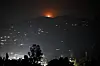 A flare goes up in air over the hill near main town of Poonch district, on May 7. India said the same day that it carried out ″precision strikes at terrorist camps″ inside Pakistan and Pakistani-controlled Kashmir, days after it blamed Islamabad for a deadly attack on the Indian side of the contested region. [AFP/YONHAP]