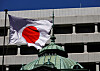 The Japanese national flag waves in Tokyo on March 18, 2024. [REUTERS/YONHAP]