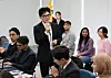 International students are seen at a meeting held at Ulsan National Institute of Science & Technology, one of the leading science universities in Korea, in November 2023. Then-Justice Minister Han Dong-hoon is seen in the photo while grabbing a microphone. [YONHAP]