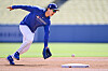 Los Angeles Dodgers second baseman Kim Hye-seong fields a ball during warm-ups before a game against the Toronto Blue Jays at Dodger Stadium in Los Angeles on Aug. 10. [REUTERS/YONHAP]