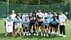 Korean Homeless World Cup players, in sky blue, and Tottenham Hotspur pose in Seoul on Friday. [FIFA]