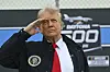 President Donald Trump salutes as he attends the Nascar Daytona 500 auto race at Daytona International Speedway, on Feb. 16, in Daytona Beach, Florida, U.S. [POO/AP/YONHAP]