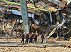 Firefighters rescue and transport a buried worker following the collapse of a boiler tower at the Ulsan Thermal Power Plant in Nam District, Ulsan, on Nov. 7. The worker was later pronounced dead at a hospital. [ULSAN FIRE DEPARTMENT]