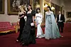 Members of K-pop girl group Blackpink head into the state banquet at Buckingham Palace in London Tuesday, celebrating the state visit to Britain by President Yoon Suk Yeol. [AP/YONHAP]
