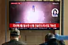 North Korea fired an unidentified ballistic missile on Oct. 22, marking its first missile launch since the start of the Lee Jae Myung administration and its fifth this year. It was the North’s first ballistic missile provocation in 167 days since May 8. In this photo, people watch a news report of the launch at Seoul Station in central Seoul on Tuesday. [YONHAP]