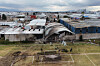 Rescue workers inspect the site of a plane crash near Toluca airport in San Mateo Atenco, Dec. 15.  [AP/YONHAP]