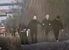 A man surnamed Kim who was arrested on suspicion of murdering his former girlfriend, a missing woman, is escorted by police after pointing out the location in Chungju Lake where he abandoned her vehicle, on Nov. 26, in this photo provided by a civilian to Yonhap. [YONHAP]