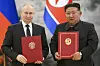 Russian President Vladimir Putin, left, and North Korea's leader Kim Jong-un pose for a photo during a signing ceremony of a new partnership in Pyongyang, North Korea, on June 19, 2024. [AP/YONHAP]
