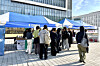 Students browse K-campus booths at the Songdo Global Fair held at Yonsei University's Songdo Campus in Incheon on Nov. 13. [DANIELA GONZALEZ PEREZ]