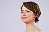U.S. actor Emma Stone poses on the red carpet before the screening of the movie ″Bugonia″ presented in competition at the 82nd International Venice Film Festival, at Venice Lido on Aug. 28. [AFP/YONHAP]