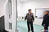 This file image, captured from the Korean Central Television on Oct. 31, shows North Korean leader Kim Jong-un, center, inspecting Kangdong County Hospital on Oct. 30, while its construction neared completion. [KOREAN CENTRAL TELEVISION]