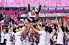 The Heungkuk Life Insurance Pink Spiders toss Kim Yeon-koung into the air after winning the 2024-25 V League Championship at Incheon Samsan World Gymnasium in Incheon on April 8. [YONHAP]