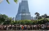 BTS fans, dubbed ARMY, cheer in celebration of Jimin and Jungkook's discharge in front of their agency HYBE headquarters in central Seoul on June 11. [YONHAP]