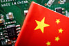 A Chinese flag is displayed next to ″Made in China″ marking on a printed circuit board in this illustration from Feb. 17, 2023. [REUTERS/YONHAP]