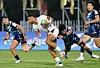 Korea's Kim Chan-ju tackles a Hong Kong player during the final of men's rugby sevens tournament at the Hangzhou Asian Games in Hangzhou, China on Tuesday. [YONHAP]