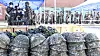 Reserve force members receive rifles at the Army’s 2nd Logistics Support Brigade in Chuncheon, Gangwon on June 21, 2022. [YONHAP]