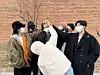 BTS members pose for the camera as they support Jin in a photo posted on Dec. 13, 2022, the day that Jin began his military service. [BIGHIT MUSIC/SCREEN CAPTURE]